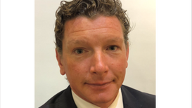 Mark Browne preside.png